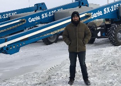 3_Gokhan with Genie Equipment in Snow_low_res