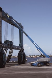 What is the difference between an articulating boom and a telescopic boom?
